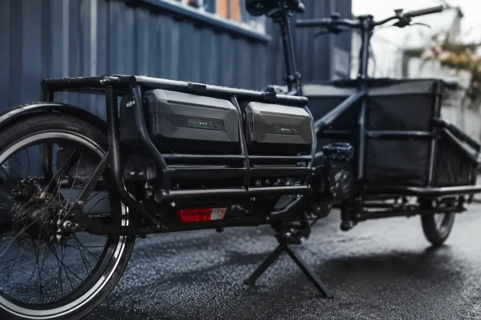 Two matching lithium packs suggesting a dual-battery cargo range-extender setup